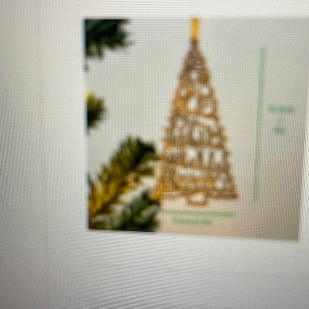 Laser Cut wooden Christmas tree ornament with festive scene